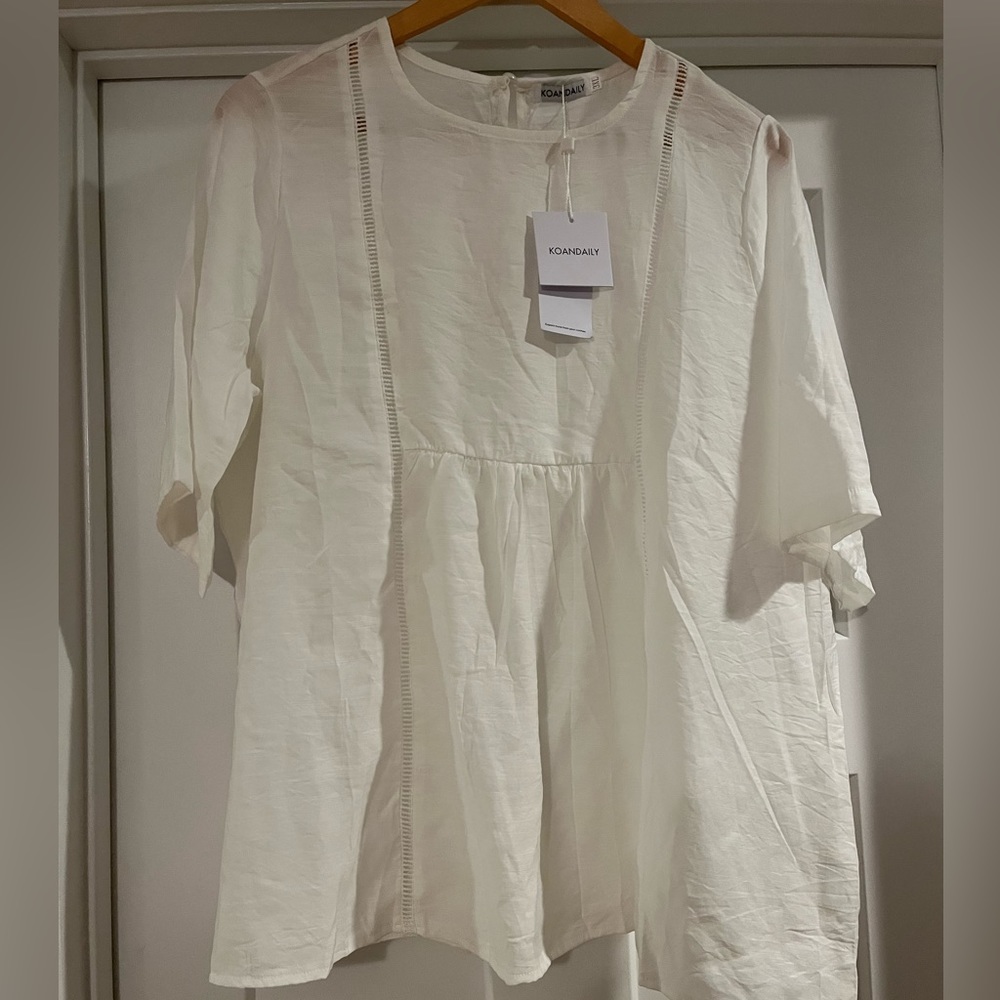 White baby doll top, NWTs.